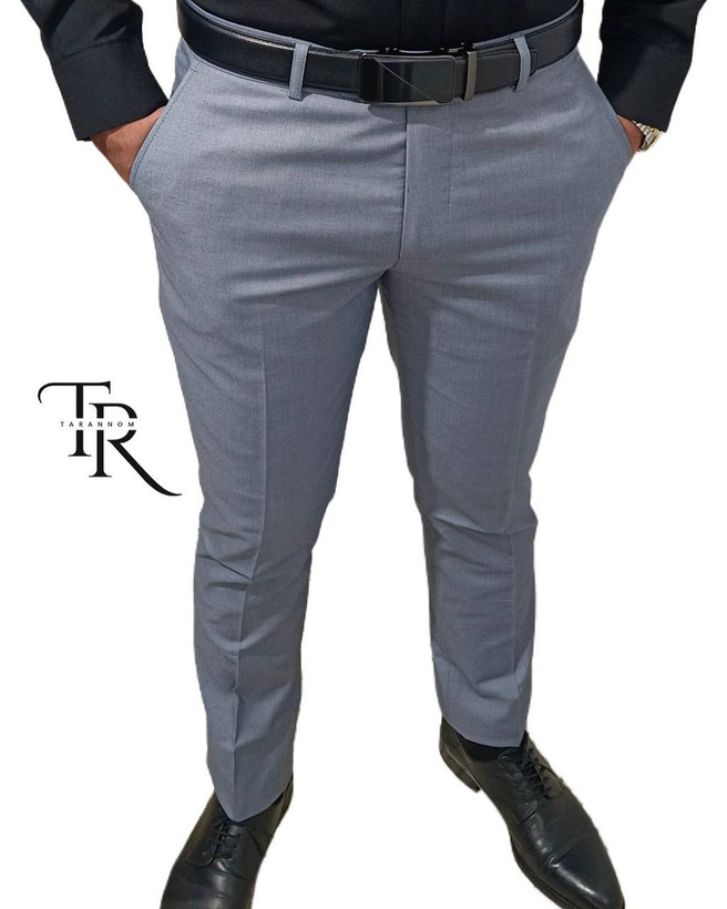 شلوار پارچه ای فاستونی(التین) الگو کلاسیک در ۵ رنگمتفاوت سایز بندی ۴۴ تا ۵۲ به همراه استر زانو دوخت تمام صنعتی